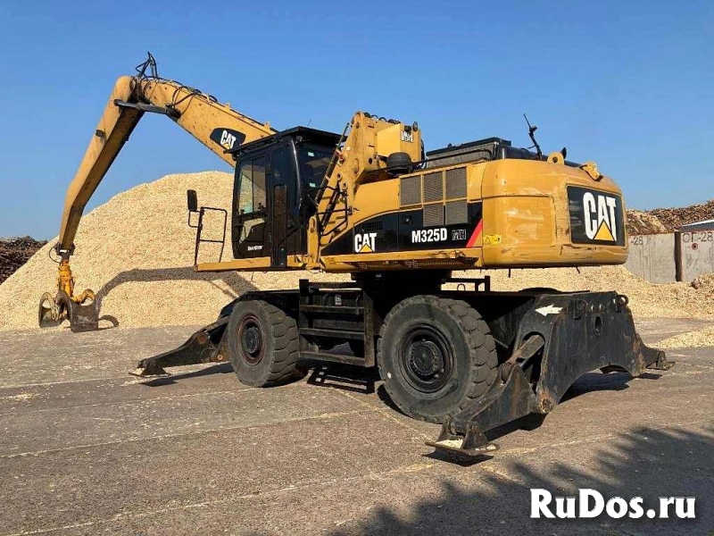Перевалочник CAT 325, 2013 г. из Европы изображение 4