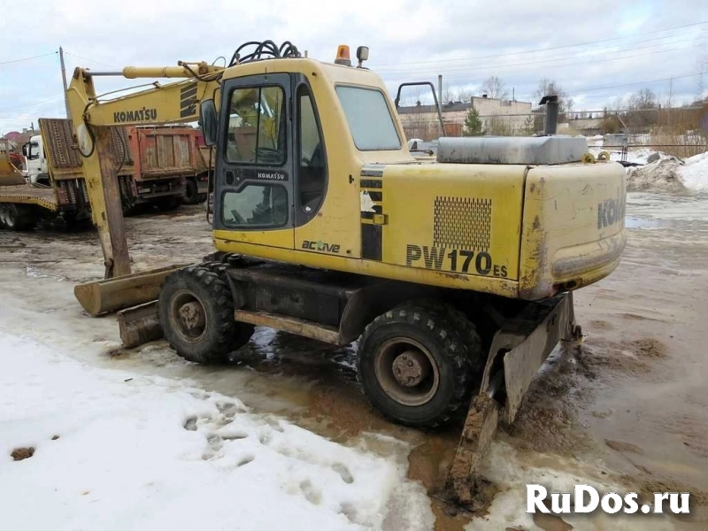 Колесник Komatsu 170, 19 т., 2 ковша, макс. опции фотка