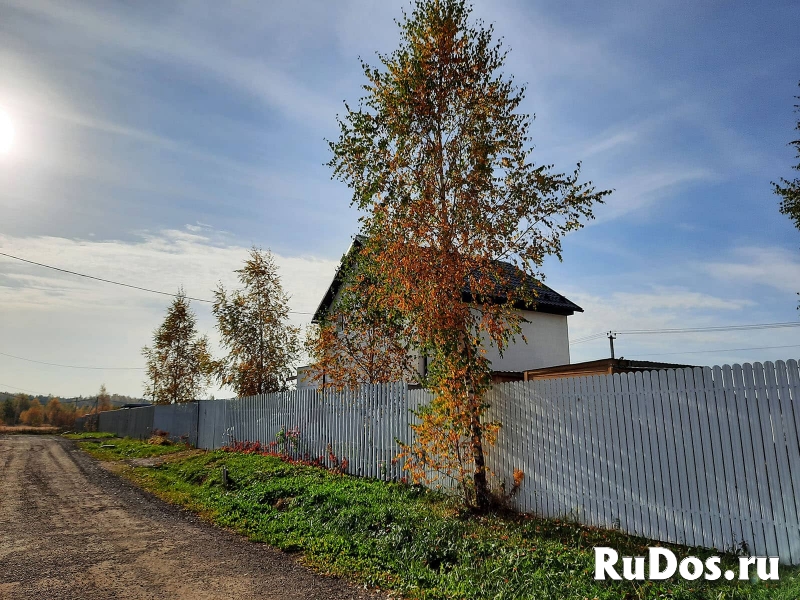 Участок в жилом поселке, рядом с водохранилищем. фото