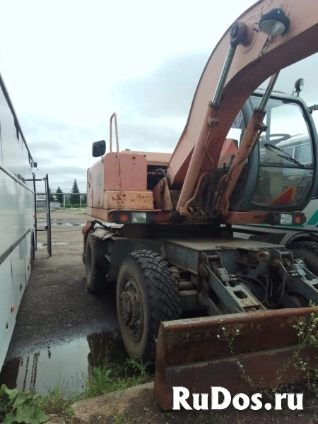 Экскаватор ЕК-12-00 , гос. № УВ4011 фото