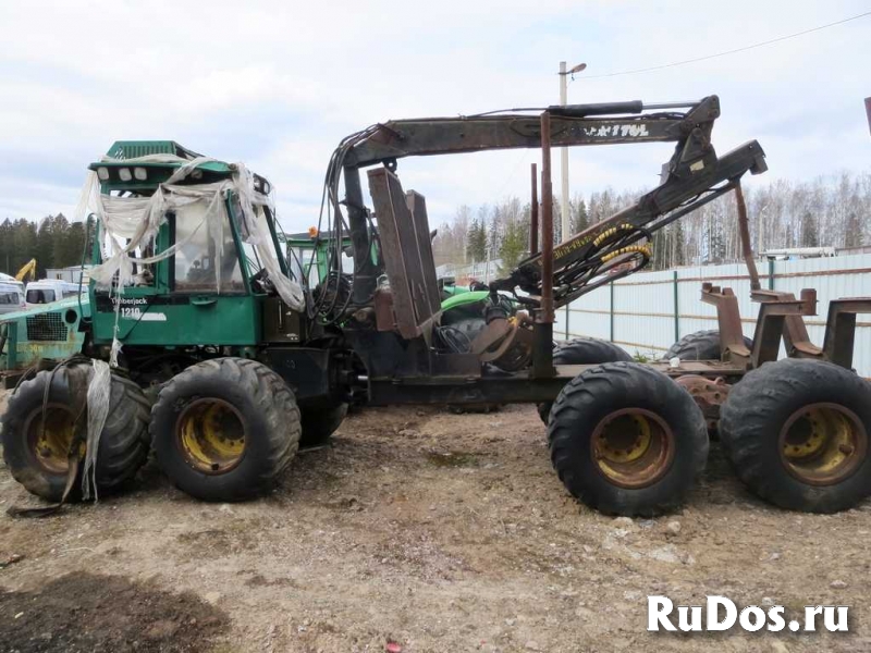 Форвардер Timberjack 1210 8W, гусеницы изображение 3