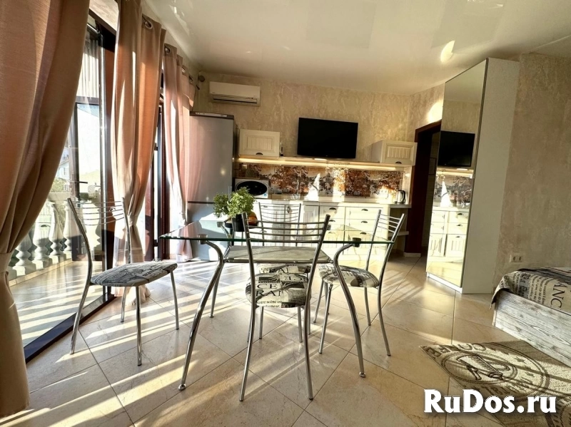 Апартаменты с теплым бассейном в центре Сириуса изображение 3