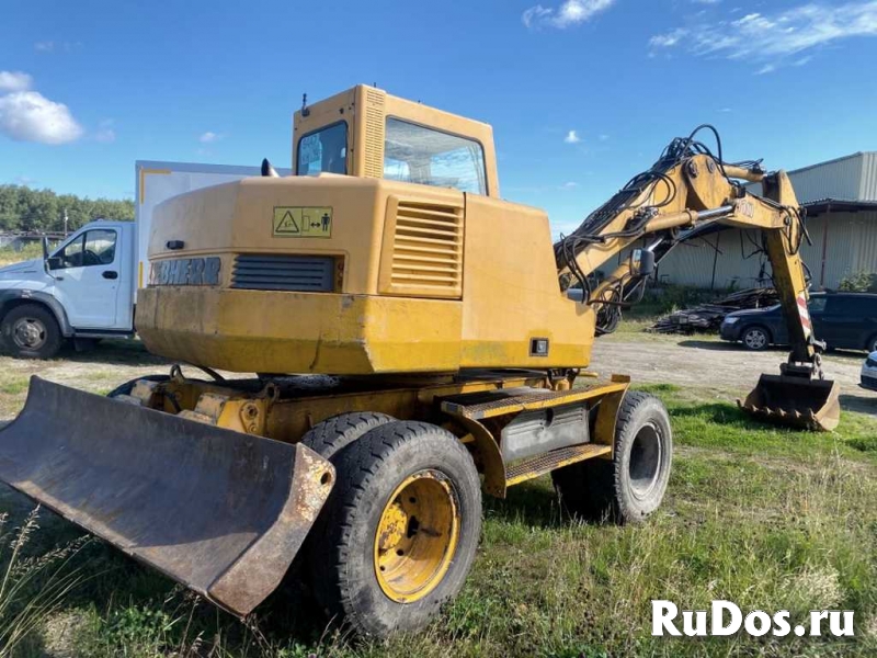 Колесник Liebherr 310, 12 т, доп. линии, 2 ковша фотка