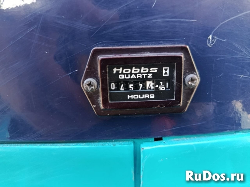 Японский мини-экскаватор Kubota K-005 фото