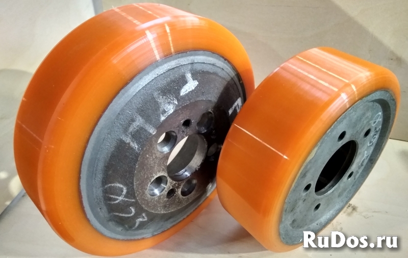 Восстановление полиуретанового покрытия колес и роликов для склада фото