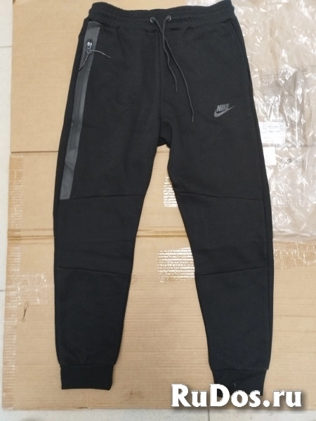 Брюки Nike Sportswear Tech Fleece фото