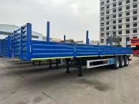 Полуприцеп с бортовой платформой TONGYADA CTY9603LBD 3-оси, грузоподъёмностью 50 тонн, с фитингами под контейнер, новый 2025 г.в картинка из объявления