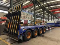 Полуприцеп-трал с трапами TONGYADA CTY9804TDPS высокий, 4-оси, грузоподъёмностью 65 тонн, новый картинка из объявления