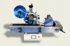Автоматический этикетировщик для узких цилиндрических тар ЭН00.03 картинка из объявления