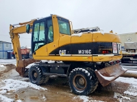 Габаритный колёсный экскаватор CAT 316C картинка из объявления